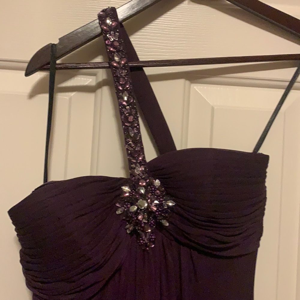 floor length gown with Asymmetrical top.